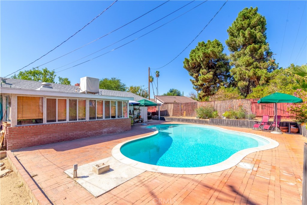 41320 Linda Vista Court Hemet, CA 92544 - Photo 27 of 31 a view of a house with a swimming pool