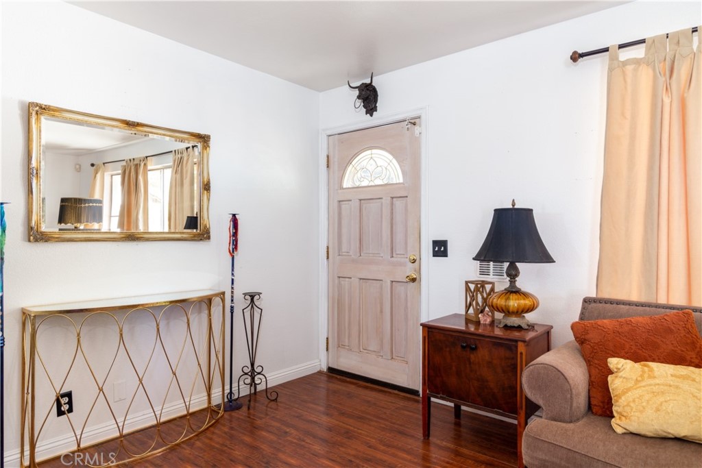 41320 Linda Vista Court Hemet, CA 92544 - Photo 4 of 31 a living room with furniture and a window
