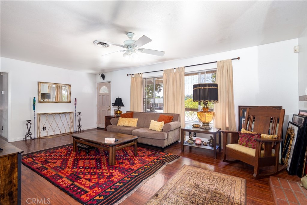 41320 Linda Vista Court Hemet, CA 92544 - Photo 7 of 31 a living room with furniture and a window