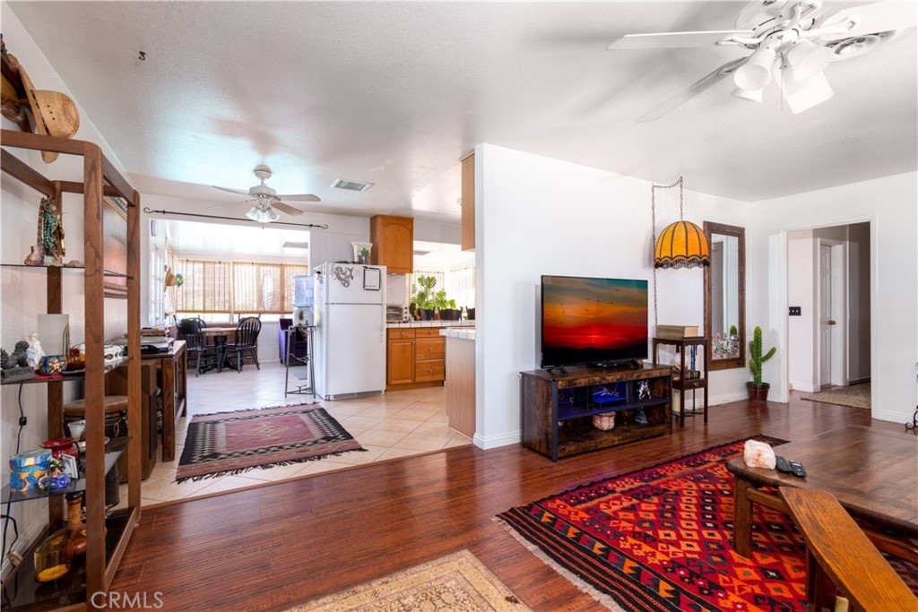 41320 Linda Vista Court Hemet, CA 92544 - Photo 8 of 31 a living room with furniture and wooden floor