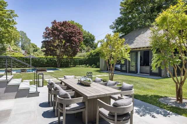 a view of a patio with swimming pool