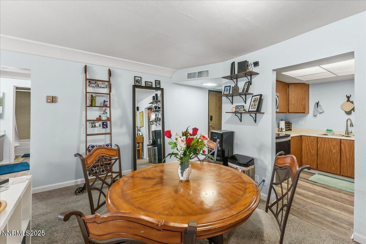 63 Vista Rafael Parkway Reno, NV 89503 - Photo 11 of 24 a dining room with furniture and window