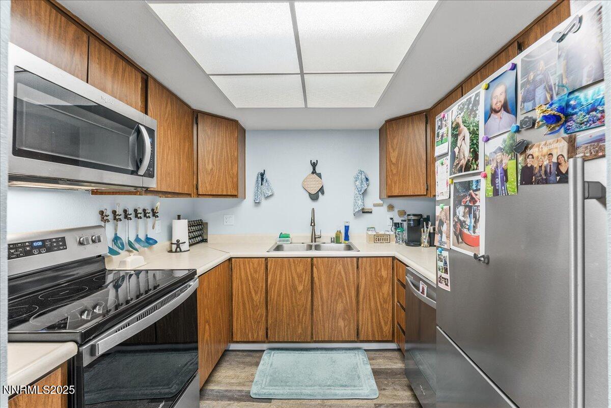 63 Vista Rafael Parkway Reno, NV 89503 - Photo 12 of 24 a kitchen with stainless steel appliances granite countertop a refrigerator and a stove