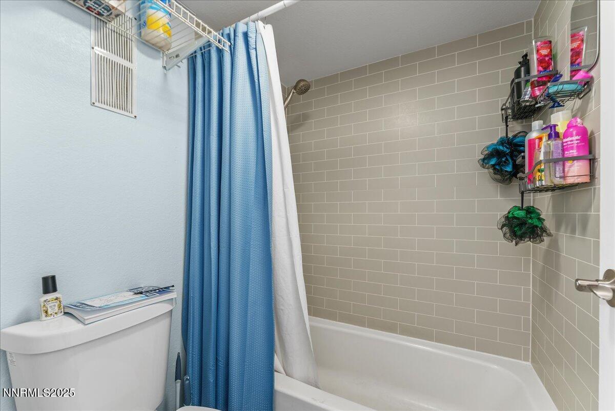 63 Vista Rafael Parkway Reno, NV 89503 - Photo 19 of 24 a bathroom with a sink toilet and shower