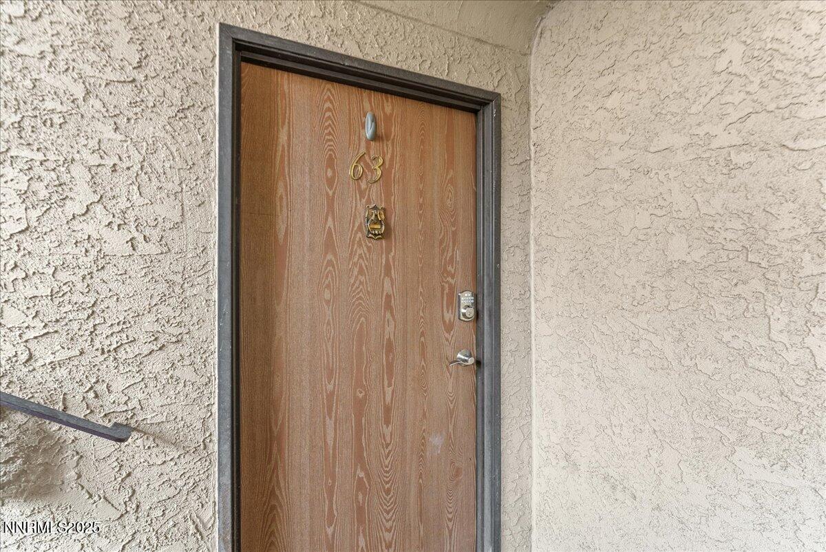 63 Vista Rafael Parkway Reno, NV 89503 - Photo 2 of 24 a bathroom with a shower and a door