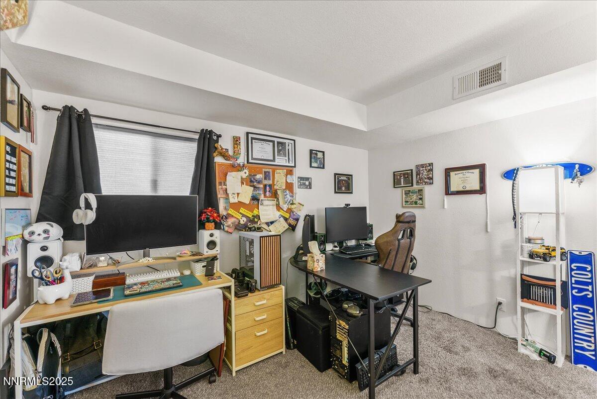 63 Vista Rafael Parkway Reno, NV 89503 - Photo 21 of 24 a view of a workspace with furniture and a window