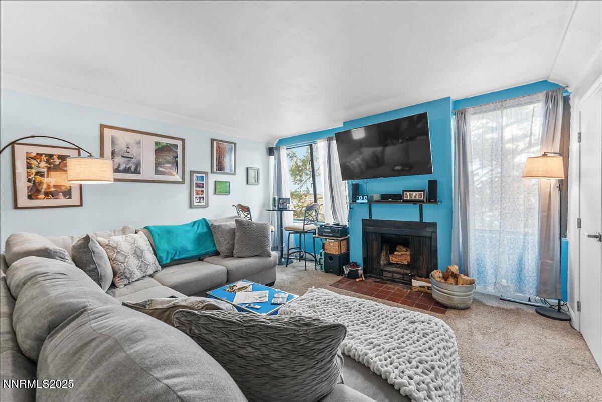 63 Vista Rafael Parkway Reno, NV 89503 - Photo 4 of 24 a living room with furniture and a fireplace