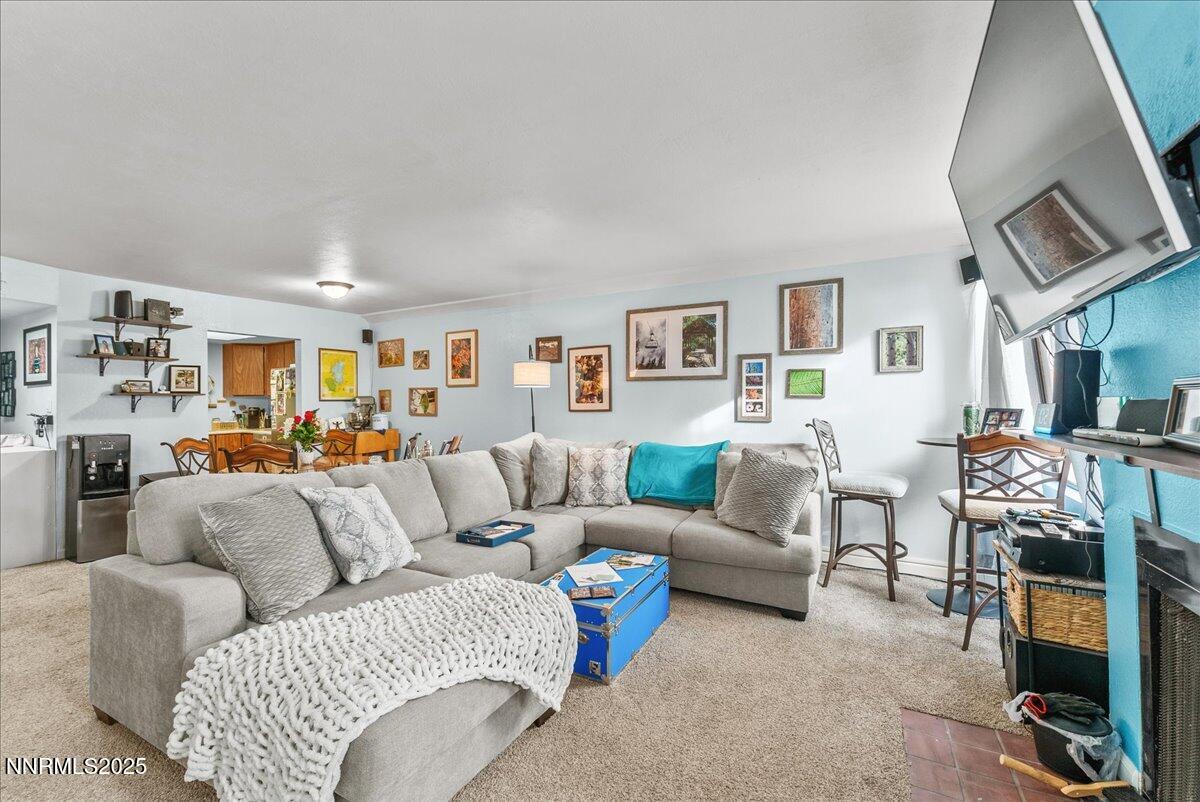 63 Vista Rafael Parkway Reno, NV 89503 - Photo 6 of 24 a living room with furniture and a flat screen tv