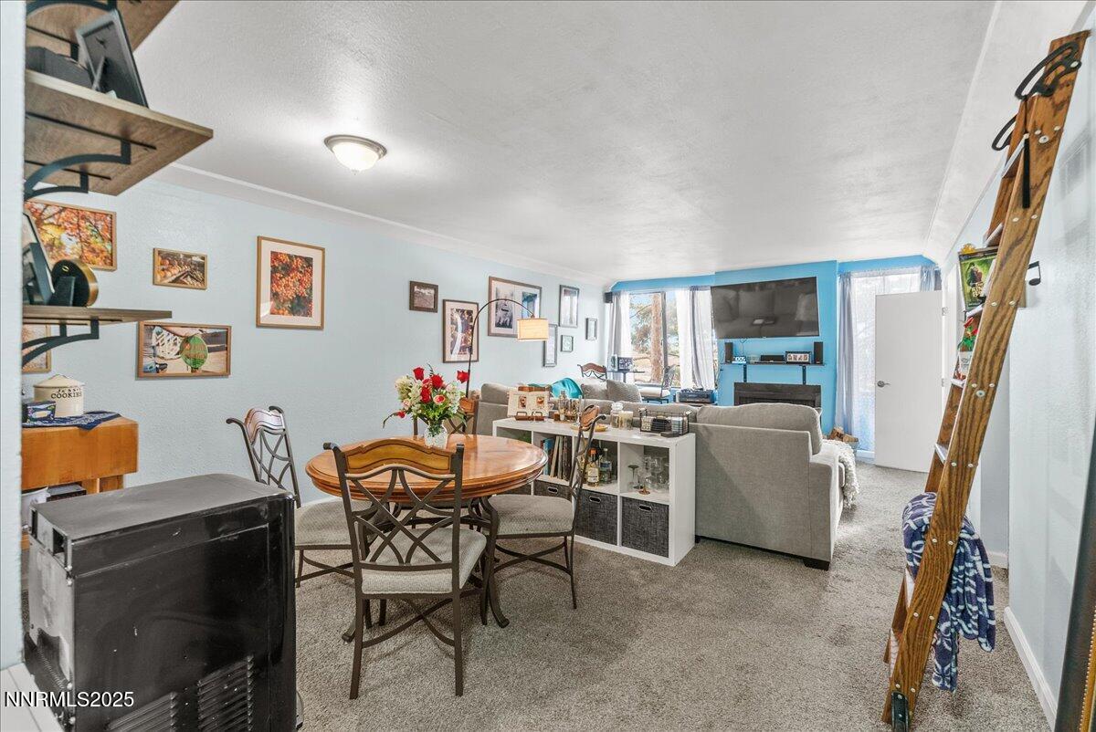 63 Vista Rafael Parkway Reno, NV 89503 - Photo 9 of 24 a dining room with furniture and a window