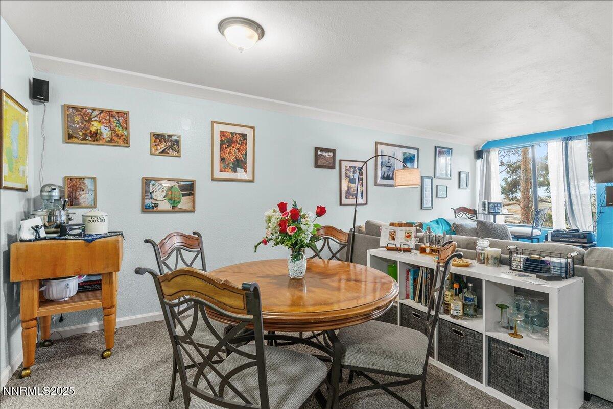 63 Vista Rafael Parkway Reno, NV 89503 - Photo 10 of 24 a view of a dining room with furniture and a window