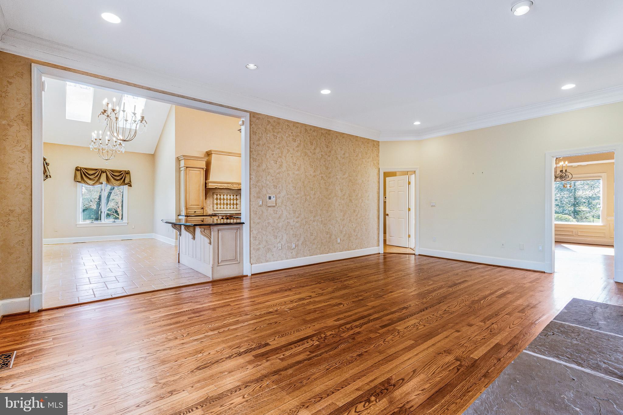 938 Douglass Drive McLean, VA 22101 - Photo 19 of 105 a view of empty room with wooden floor and fan