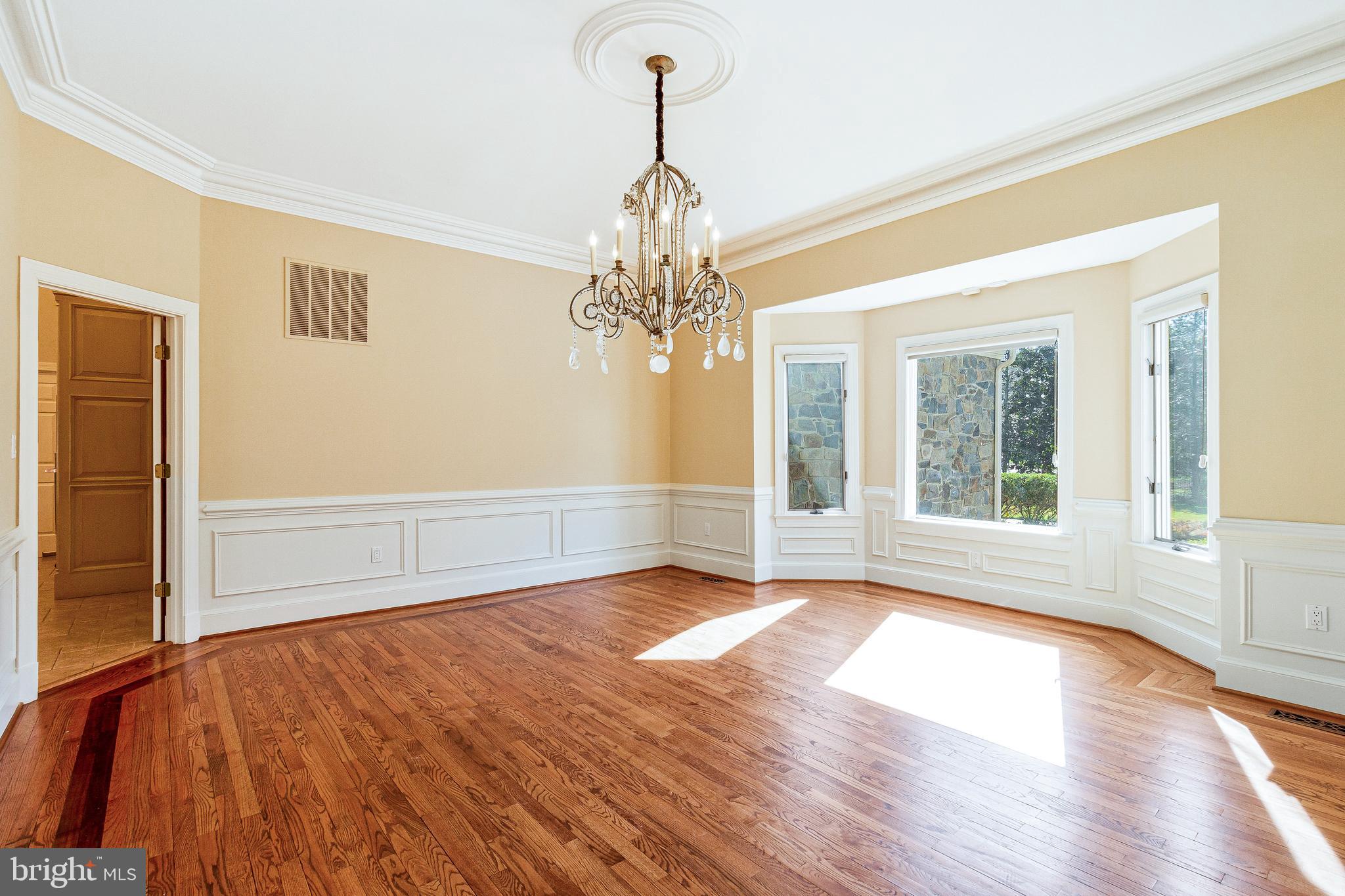 938 Douglass Drive McLean, VA 22101 - Photo 24 of 105 a view of livingroom with window and wooden floor