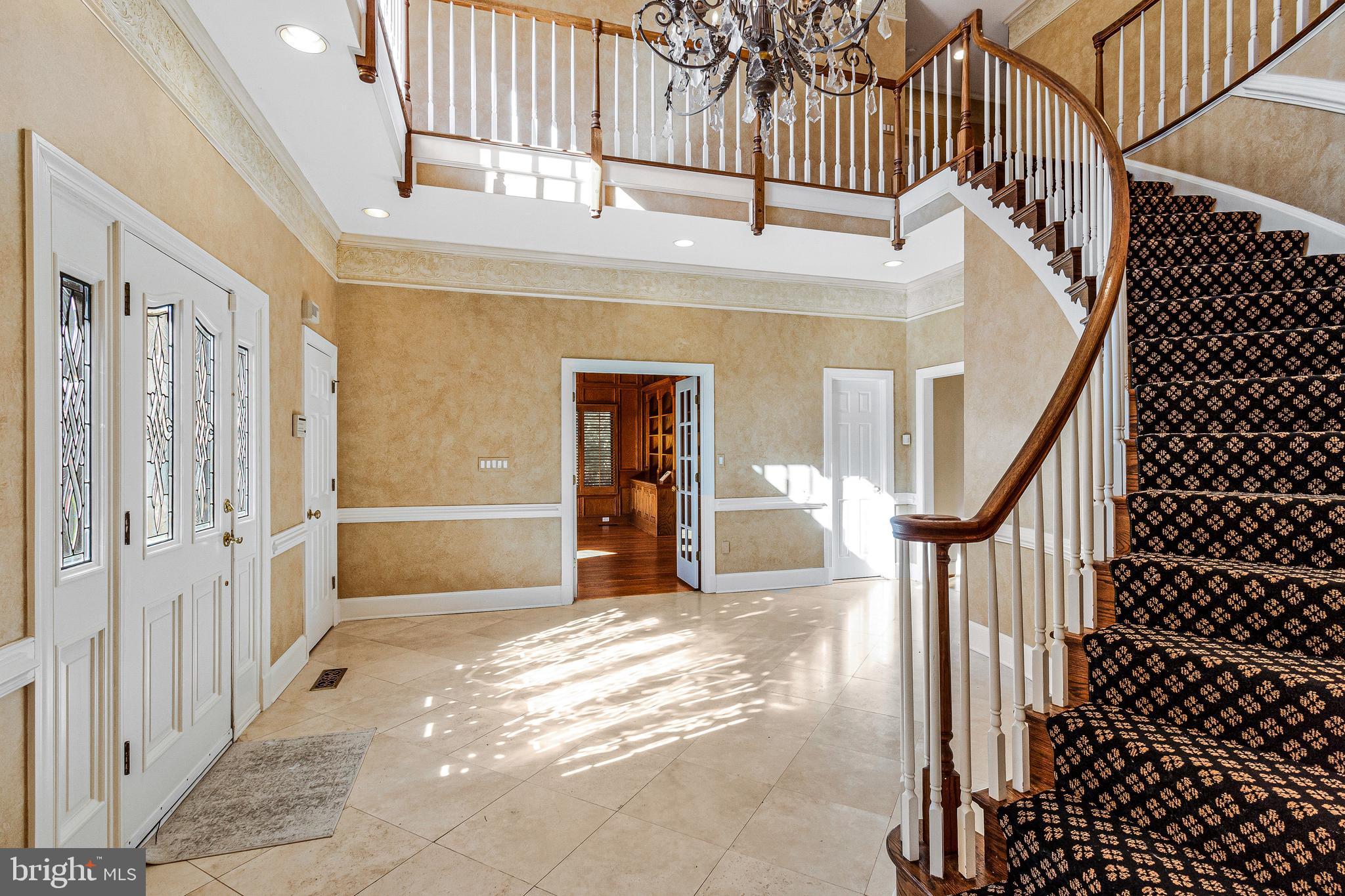 938 Douglass Drive McLean, VA 22101 - Photo 3 of 105 a view of entryway and hall with wooden floor