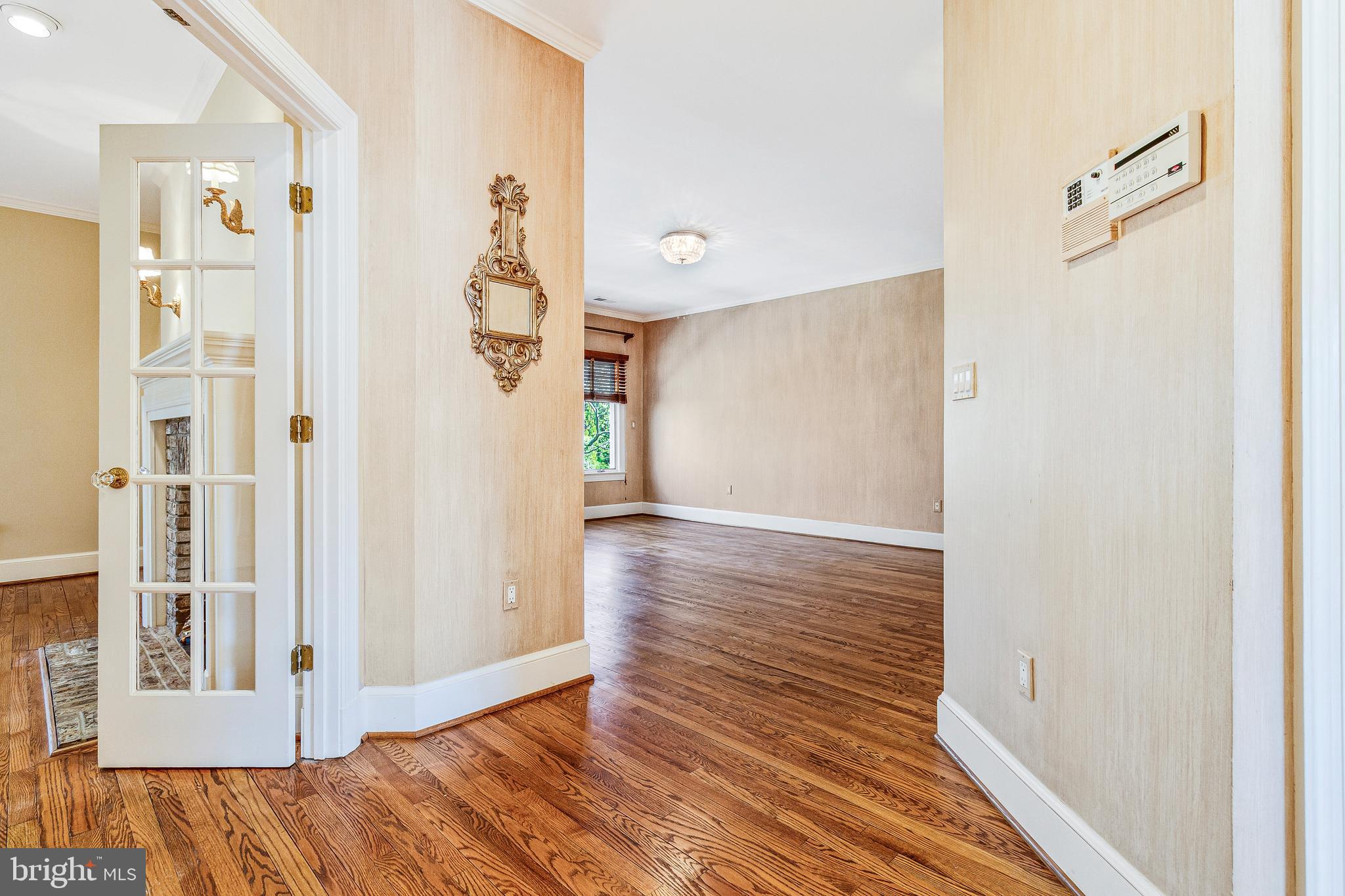 938 Douglass Drive McLean, VA 22101 - Photo 49 of 105 a view of a hallway view with wooden floor and staircase