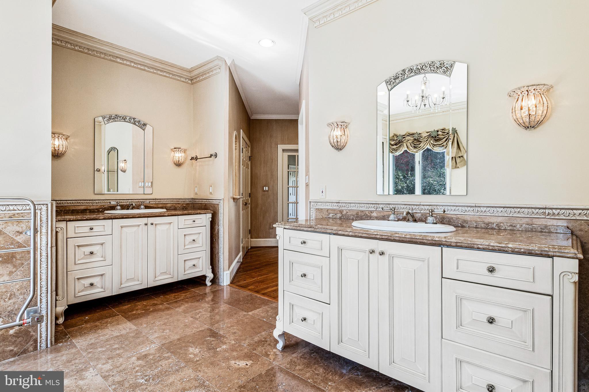 938 Douglass Drive McLean, VA 22101 - Photo 60 of 105 a spacious bathroom with a granite countertop sink and a mirror