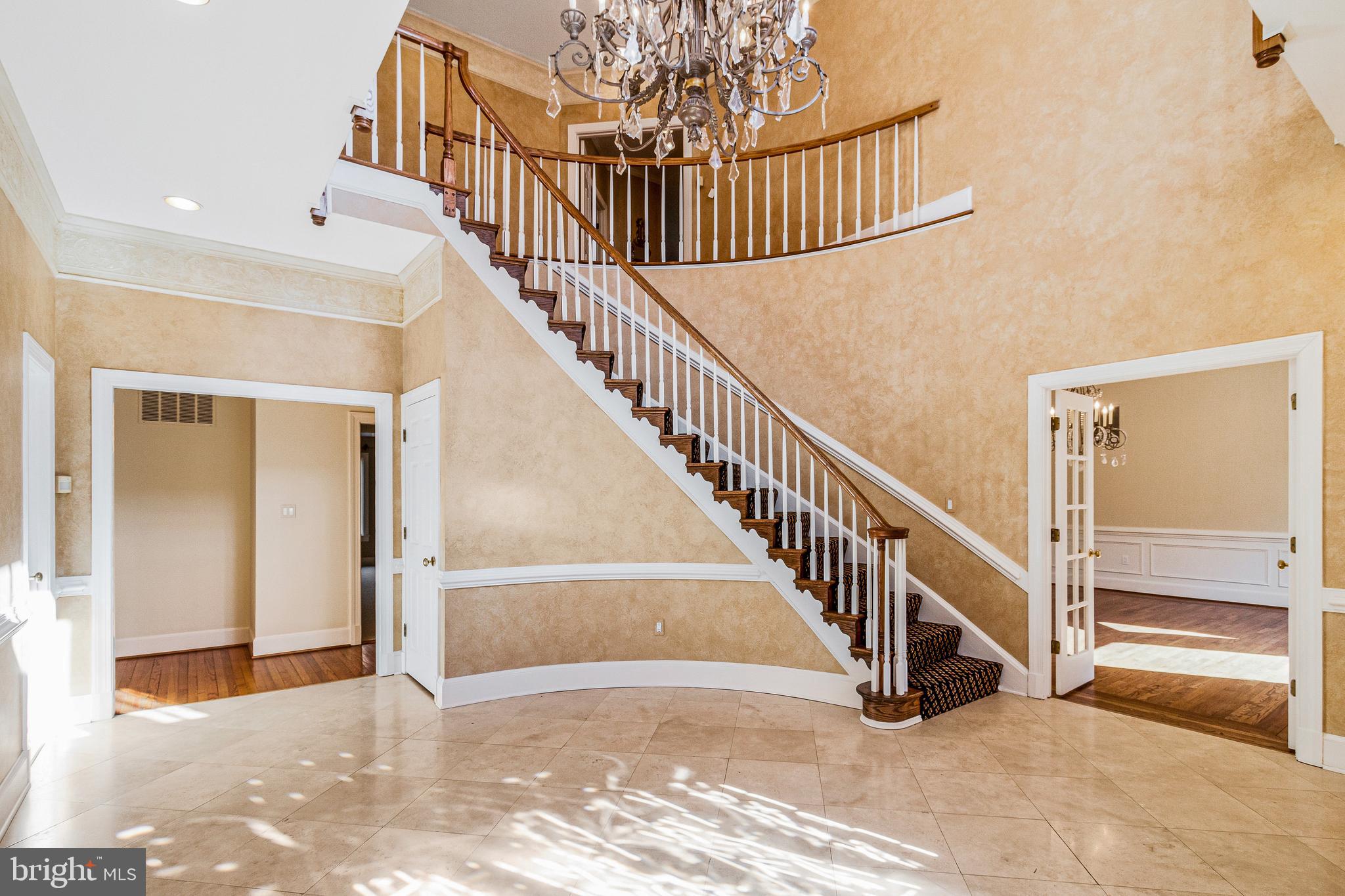938 Douglass Drive McLean, VA 22101 - Photo 6 of 105 a view of entryway and hall with wooden floor