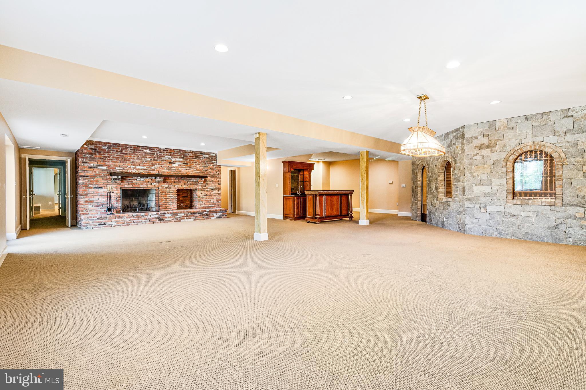 938 Douglass Drive McLean, VA 22101 - Photo 68 of 105 a living room with furniture and a fireplace