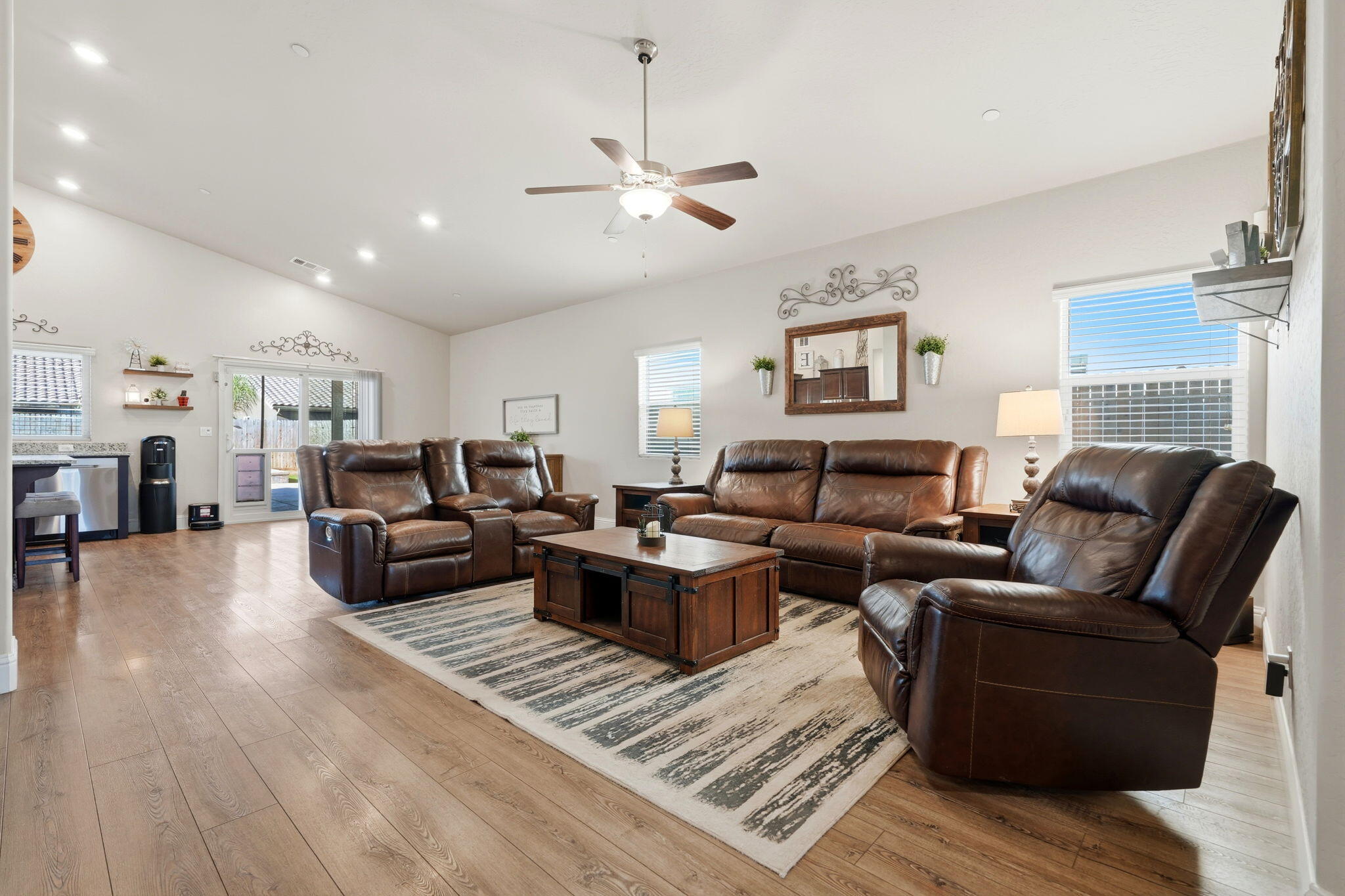 756 Strada Street Lemoore, CA 93245 - Photo 7 of 53 a living room with furniture and a fireplace