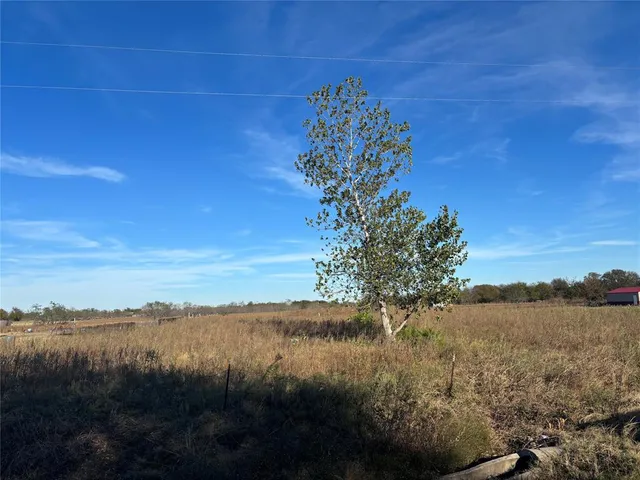 a view of lake with green space