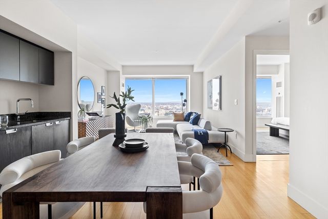 a room with furniture and a wooden floor