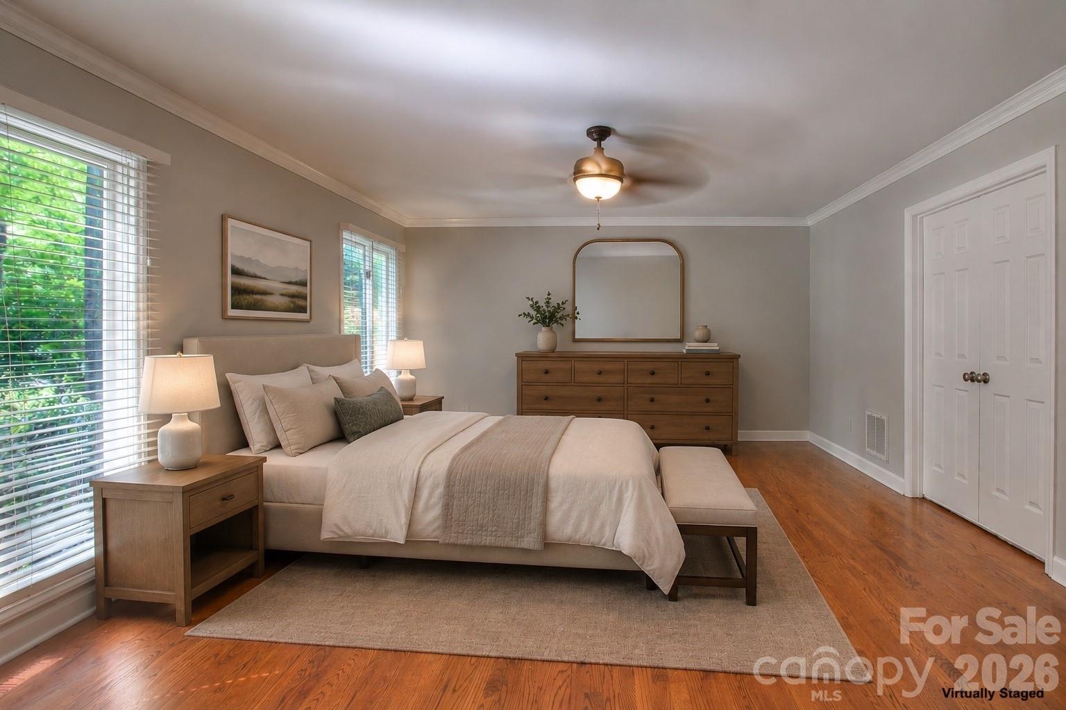 3408 Providence Manor Road Charlotte, NC 28270 - Photo 20 of 39 a bedroom with a bed and wooden floor