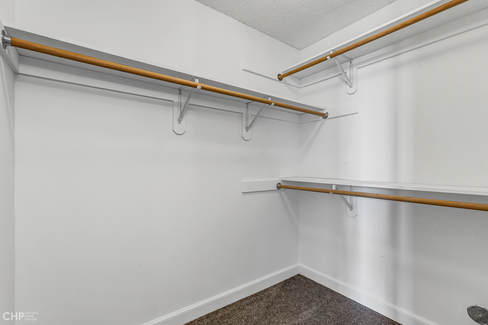 5320 North Sheridan Road, Unit 2002 Chicago, IL 60640 - Photo 26 of 57 a view of a room with racks on the wall
