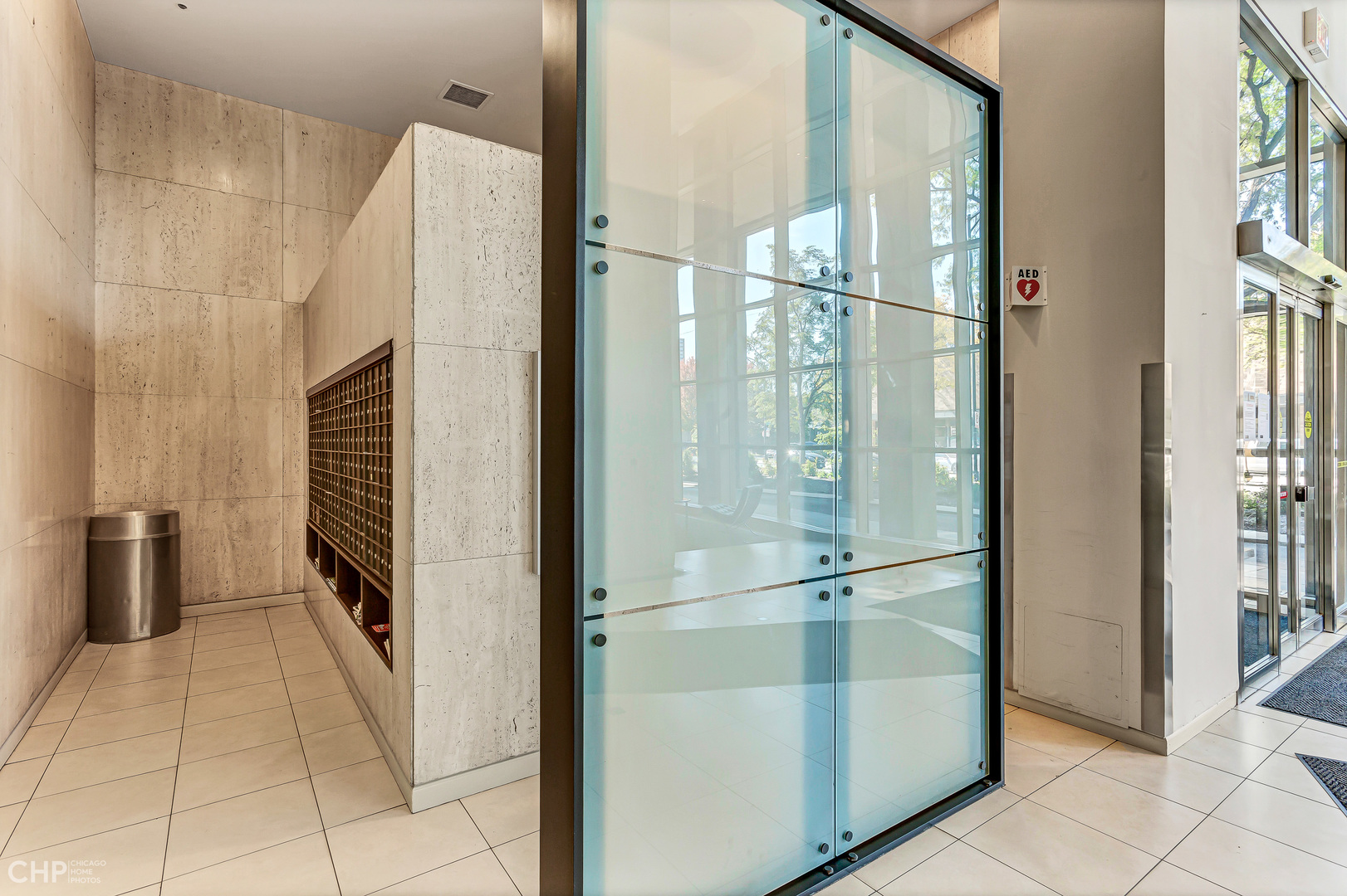 5320 North Sheridan Road, Unit 2002 Chicago, IL 60640 - Photo 54 of 57 a view of a bathroom with a glass door