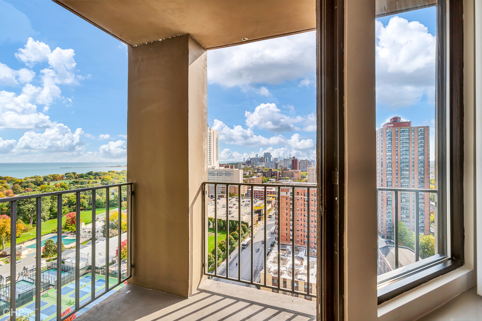 5320 North Sheridan Road, Unit 2002 Chicago, IL 60640 - Photo 7 of 57 a view of a city from a balcony