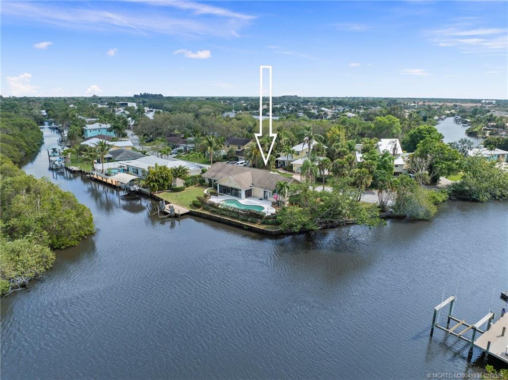 815 Southwest Salerno Road Stuart, FL 34997 - Photo 1 of 71 a view of a city street from a balcony