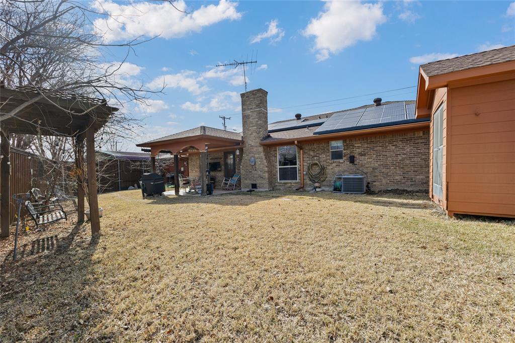 2402 Scott Mill Road Carrollton, TX 75006 - Photo 20 of 20 a view of a house with snow on the road