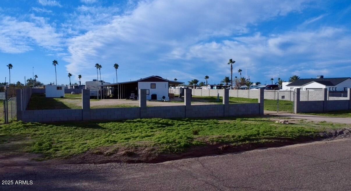 1975 West Smoketree Street Apache Junction, AZ 85120 - Photo 4 of 9 a view of a garden with sitting area