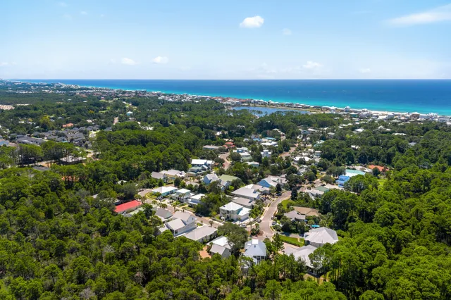 an aerial view of a house with a garden