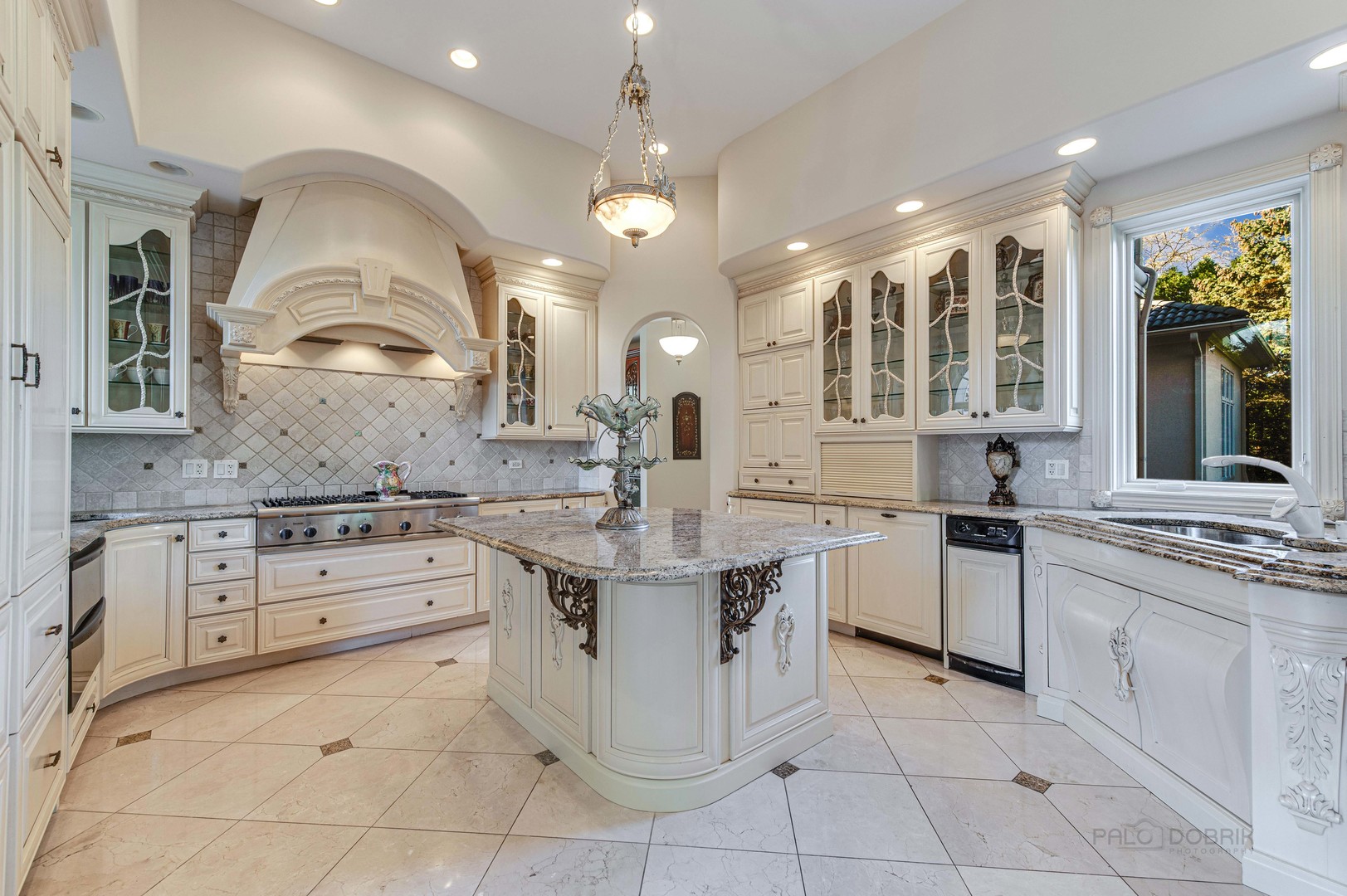 10 West Westleigh Road Lake Forest, IL 60045 - Photo 23 of 59 a kitchen with a sink stove and cabinets