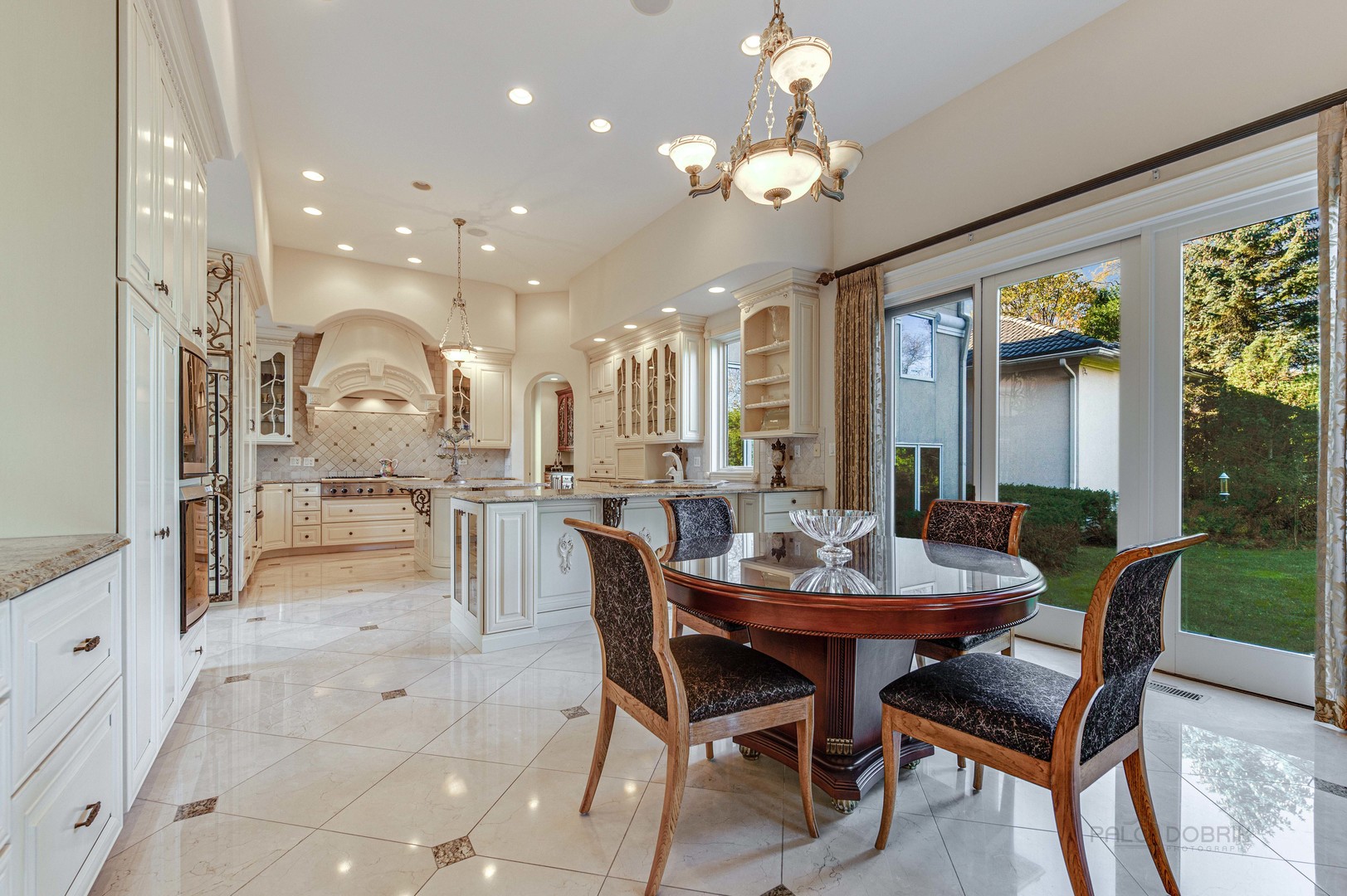 10 West Westleigh Road Lake Forest, IL 60045 - Photo 24 of 59 a view of a dining room with furniture and a chandelier