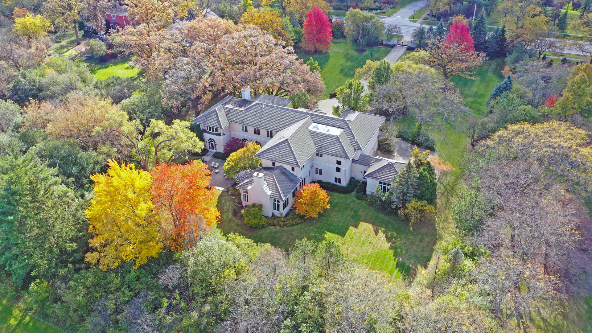 10 West Westleigh Road Lake Forest, IL 60045 - Photo 3 of 59 a view of swimming pool yard and mountain view in back