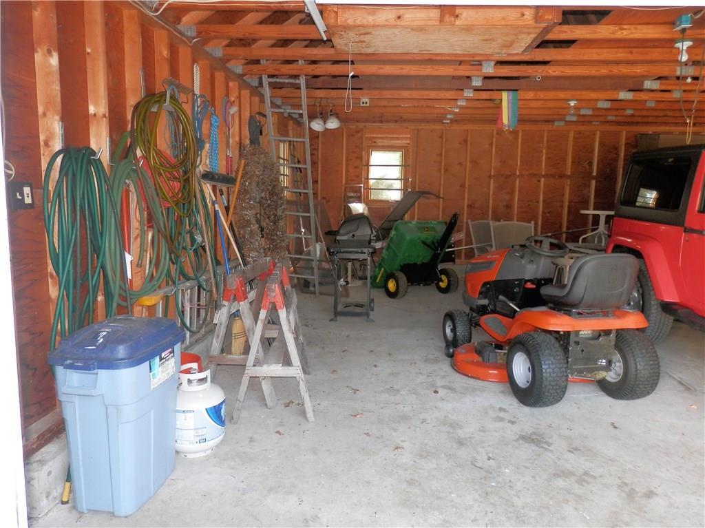 226 Atlantic Quarry Road Spruce Head, ME 04859 - Photo 23 of 35 Large garage with storage space and...