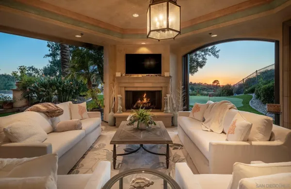 a view of a dinning table and chairs in the patio