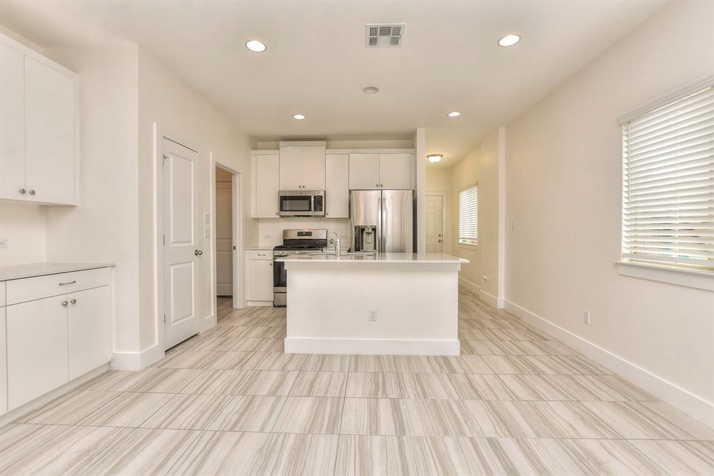 420 White Steppe Way Georgetown, TX 78626 - Photo 6 of 29 Dining Room area and kitchen
