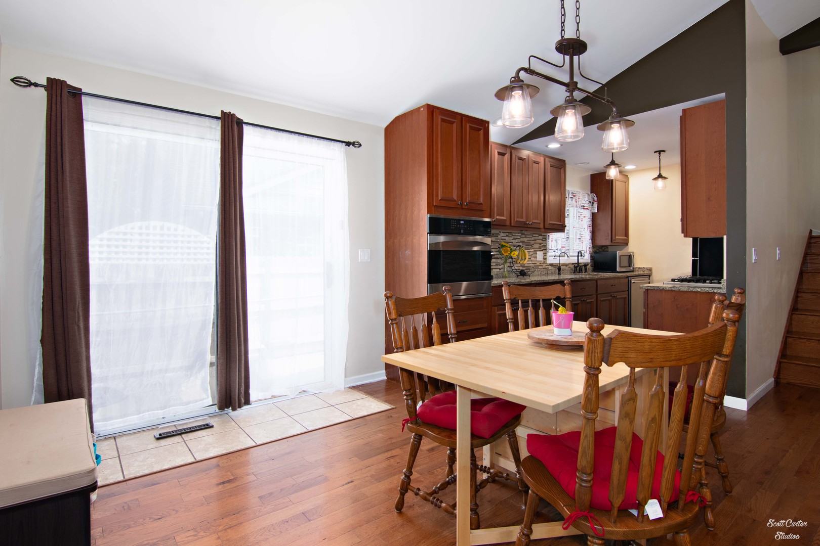 2516 Crystal Lake Road Cary, IL 60013 - Photo 11 of 22 a view of a dining room with furniture window and wooden floor