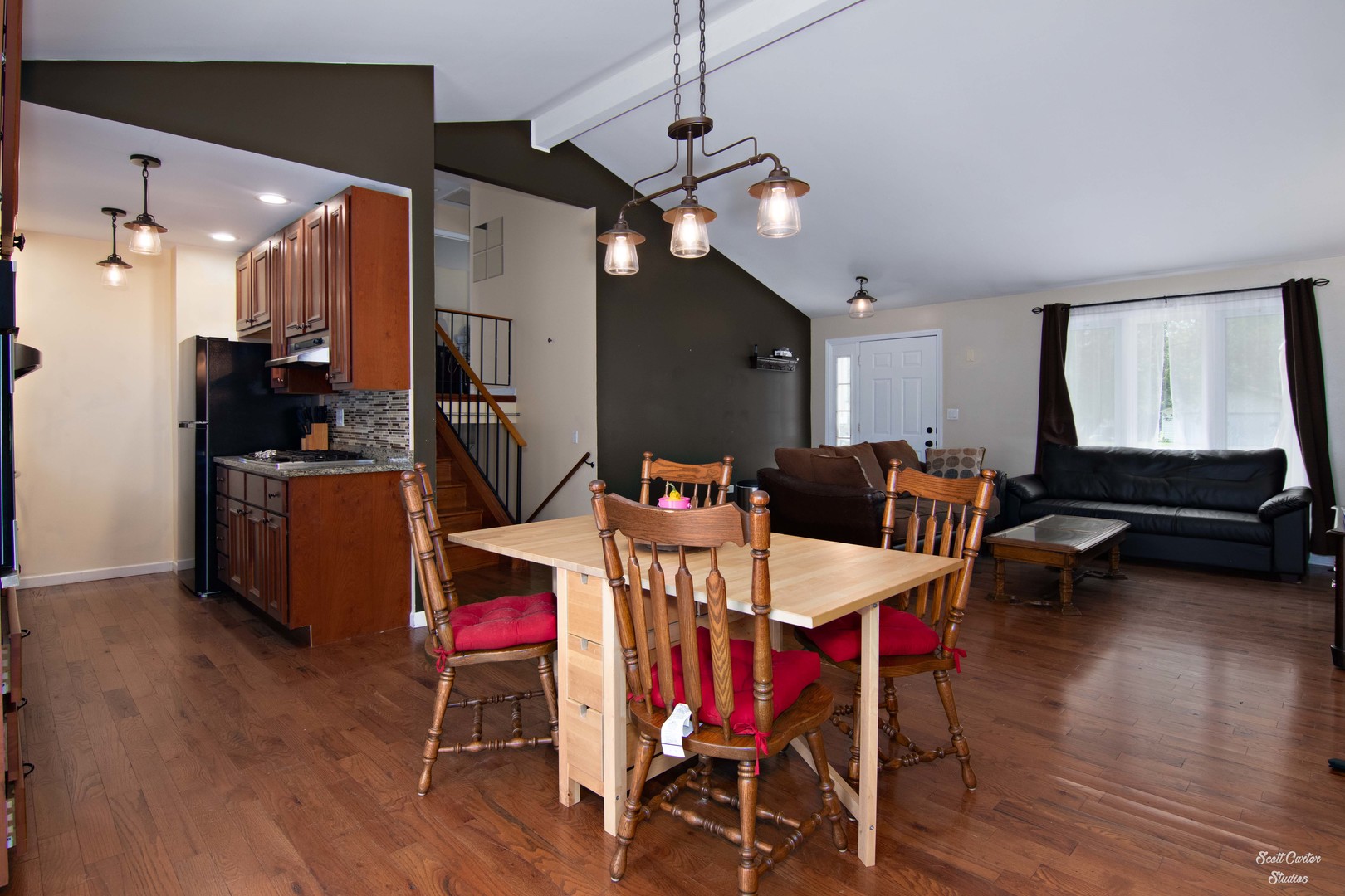 2516 Crystal Lake Road Cary, IL 60013 - Photo 12 of 22 a view of a dining room with furniture and wooden floor