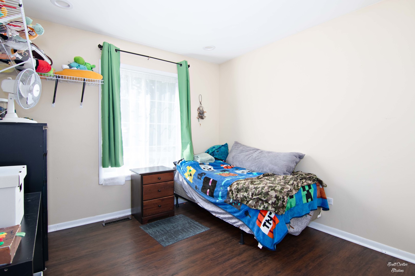 2516 Crystal Lake Road Cary, IL 60013 - Photo 20 of 22 a bedroom with a bed and a window