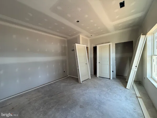 a view of balcony with wooden floor and fence
