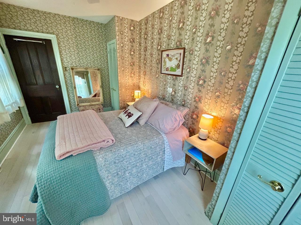 9087 Highland Street Mauricetown, NJ 08329 - Photo 21 of 48 a bedroom with a bed and a dresser in it