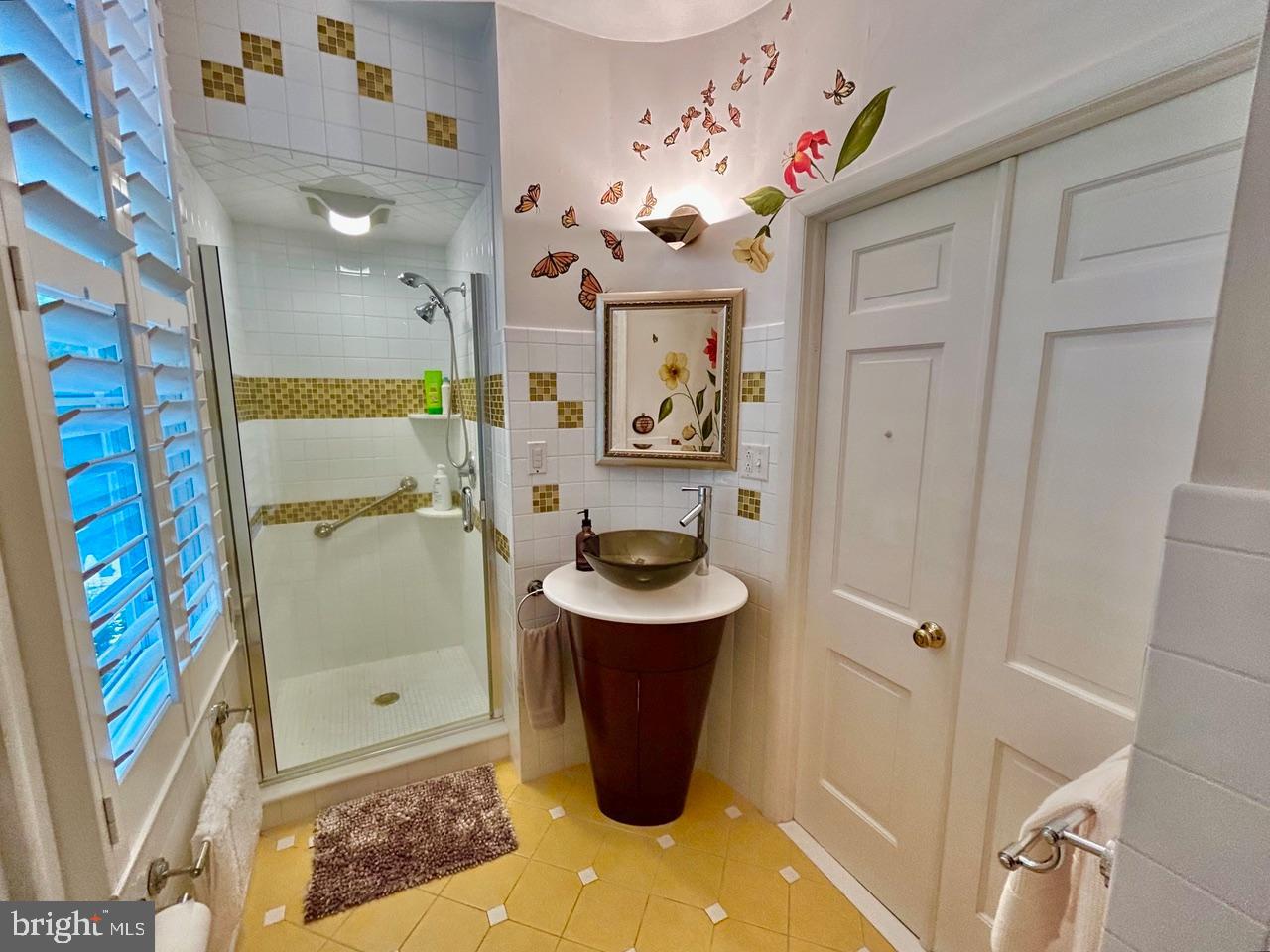 9087 Highland Street Mauricetown, NJ 08329 - Photo 24 of 48 a bathroom with a sink a toilet and shower