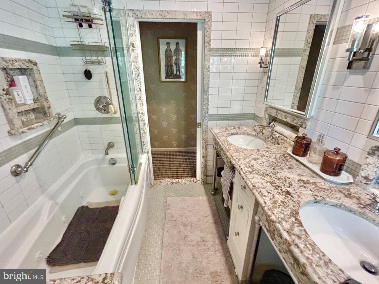 9087 Highland Street Mauricetown, NJ 08329 - Photo 29 of 48 a bathroom with a tub sink and mirror