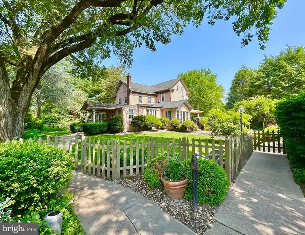 a room with water heater and refrigerator