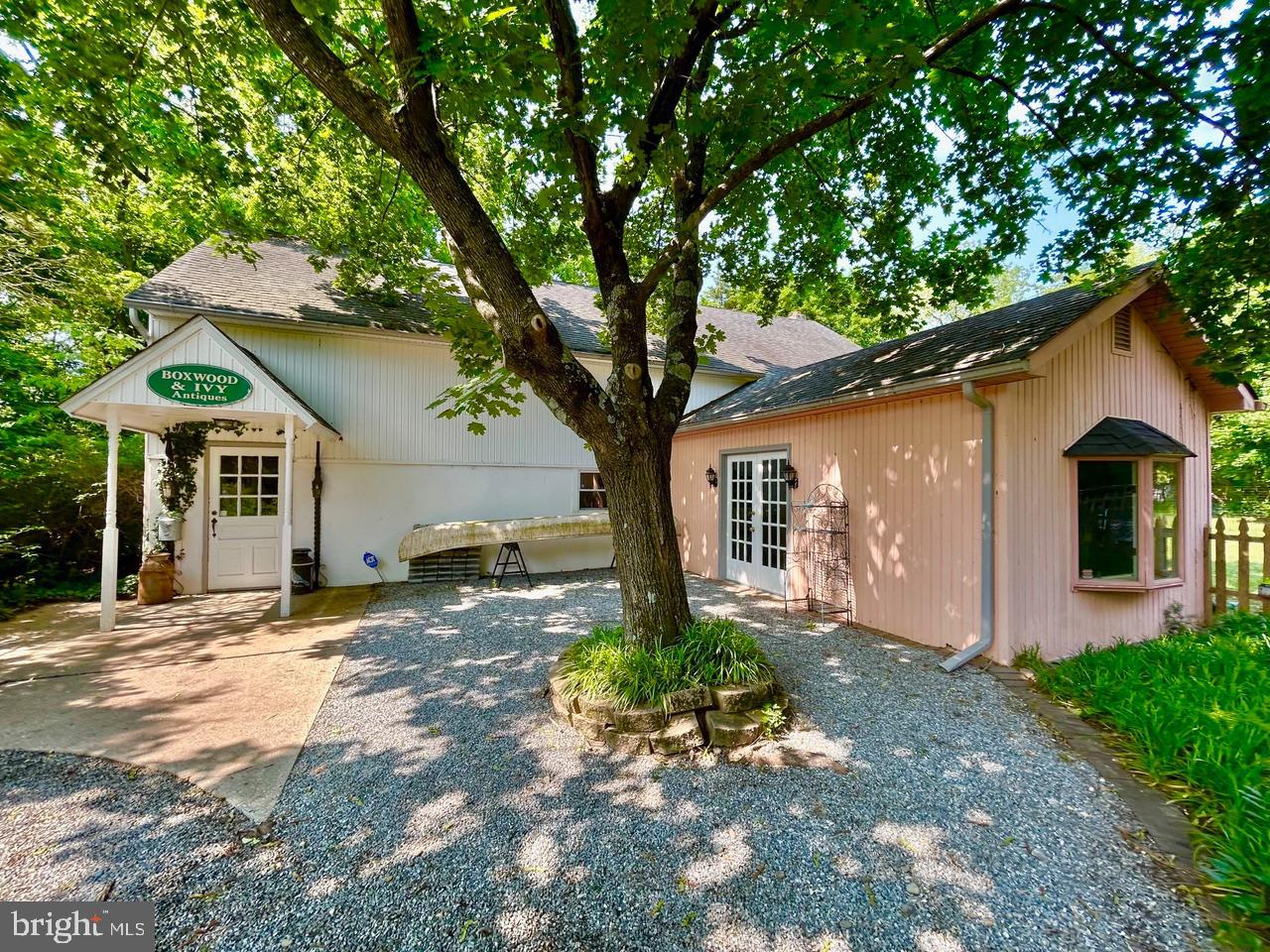 9087 Highland Street Mauricetown, NJ 08329 - Photo 44 of 48 a front view of a house with garden