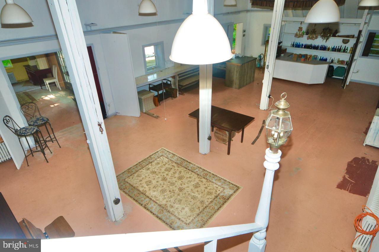 9087 Highland Street Mauricetown, NJ 08329 - Photo 46 of 48 a living room with furniture and a wooden floor