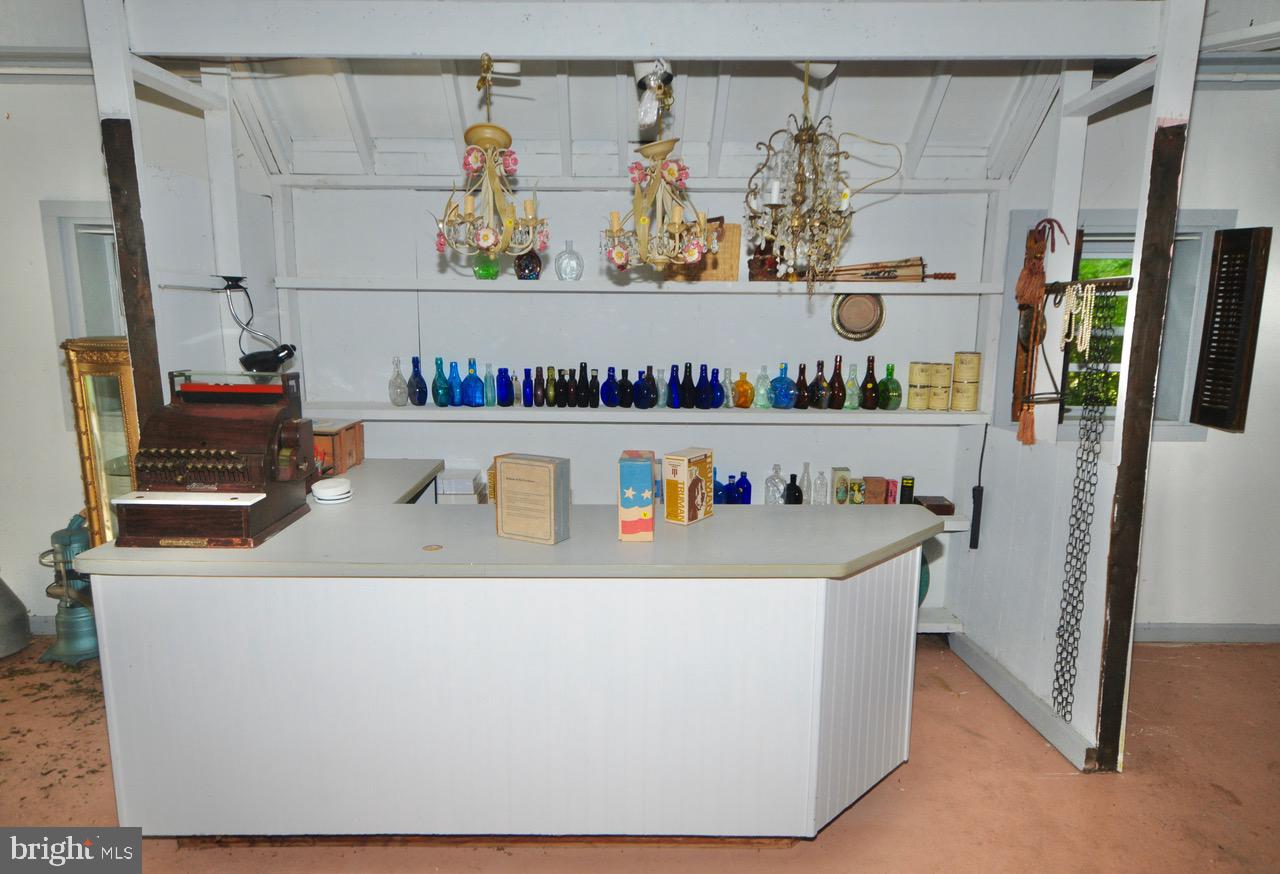 9087 Highland Street Mauricetown, NJ 08329 - Photo 47 of 48 a room with water heater and refrigerator