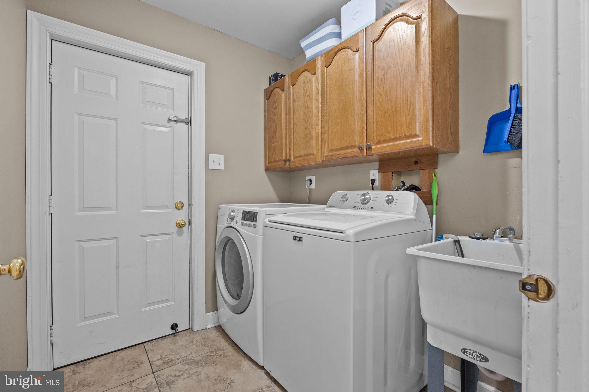 275 West Sandy Ridge Road Doylestown, PA 18901 - Photo 16 of 54 a utility room with dryer and washer